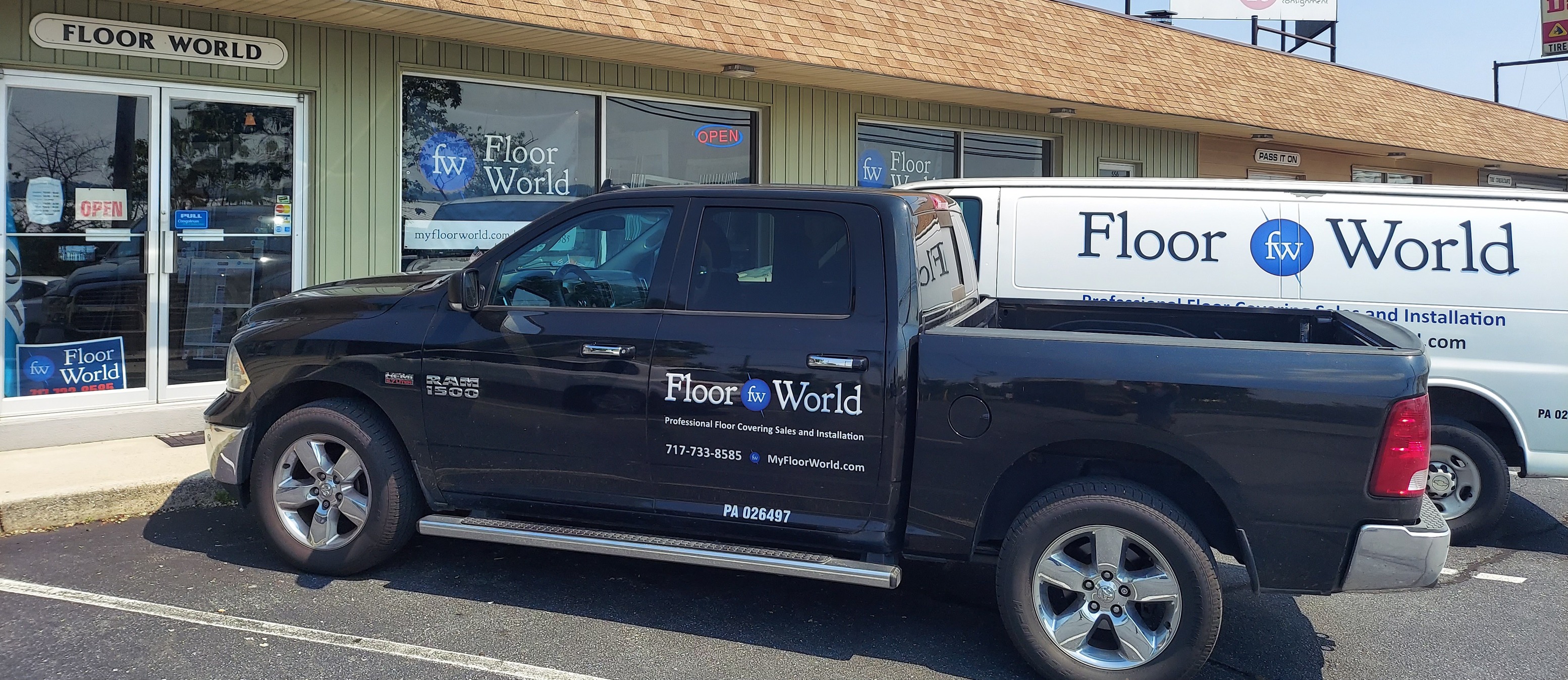 Floor World service vehicles